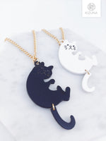 Load image into Gallery viewer, Black &amp; White Cat Long Necklace w Dangling Tail
