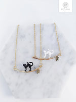 Load image into Gallery viewer, Mysterious Black &amp; White Cat Necklace
